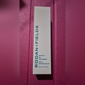 Rodan + Fields Defrizz+ Oil Treatment in White and Blue